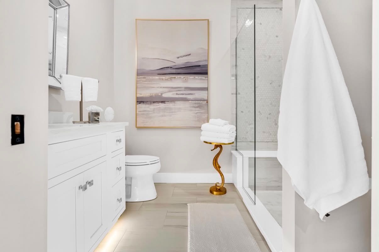 Spa bathroom with crisply folded white towels